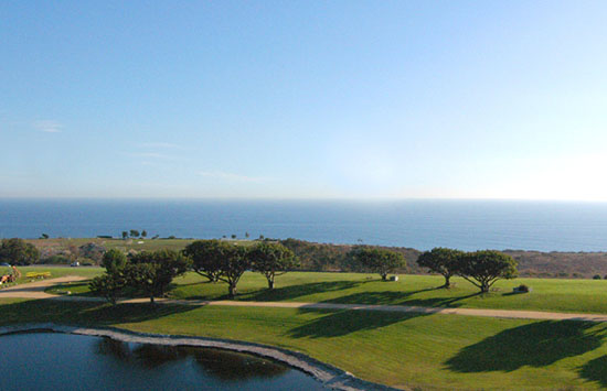 a lake overlooking the ocean
